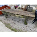 A LARGE VINTAGE WOODEN WORK BENCH ENCLOSING A SINGLE DRAWER (L:274CM)