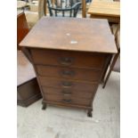 A LATE VICTORIAN OAK CHEST OF FIVE ROPE EDGE DRAWERS WITH APPLIED SIDE DECORATION, 23" WIDE