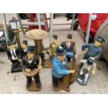 AN ASSORTMENT OF RESIN FIGURES TO INCLUDE LAUREL AND HARDY ETC