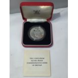 A CASED THE 3 NGULTRUM SILVER PROOF COMMEMORATIVE COINS OF BHUTAN WITH CERTIFICATE OF AUTHENTICITY