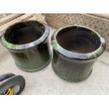 A PAIR OF GREEN GLAZED CIRCULAR PLANTERS