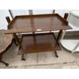 AN EARLY 20TH CENTURY OAK TWO TIER FOLDING TROLLEY, 28" WIDE