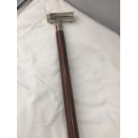 A TELESCOPIC HANDLED WALKING STICK