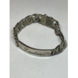 A HEAVY HALLMARKED LONDON SILVER BRACELET ENGRAVED IRELAND