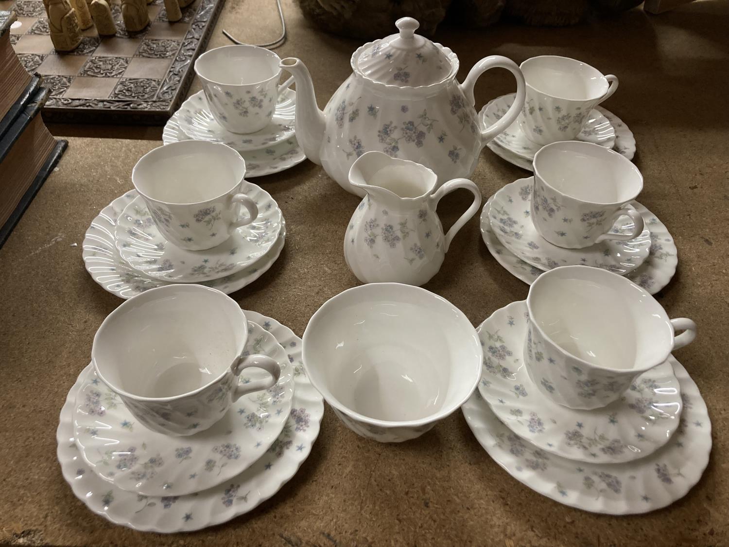 A QUANTITY OF WEDGWOOD 'APRIL FLOWERS' CHINA TO INCLUDE CUPS, SAUCERS,S PLATES, TEAPOT, CREAM JUG,