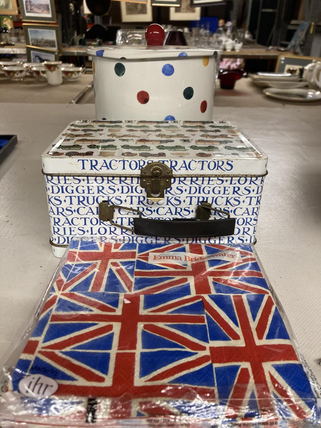 AN EMMA BRIDGEWATER BISCUIT BARREL, EMMA BRIDGEWATER UNION JACK SERVIETTES AND A VINTAGE TRACTORS