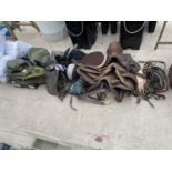 AN ASSORTMENT OF VINTAGE HORSE TACK TO INCLUDE SADDLES AND HATS ETC