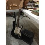 A WESTFIELD ELECTRIC GUITAR PLUS A BENSON AMPLIFIER