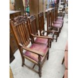 A SET OF EIGHT OAK EARLY 20TH CENTURY DINING CHAIRS ON TURNED LEGS, TWO LACKING DROP-IN SEATS