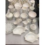 A COLLECTION OF WHITE GLASSWARE TO INCLUDE FISH DISHES, VASES, PLANTERS, CANDLESTICKS, ETC
