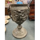 A VICTORIAN CAST IRON EMBOSSED POT HEIGHT 23CM