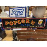 A LARGE WOODEN POPCORN SIGN 100CM X 25CM