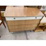AN AVALON YATTON OAK AND PAINTED FOUR DRAWER CHEST OF DRAWERS, 36" WIDE