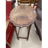 AN EARLY 20TH CENTURY OAK BARLEYTWIST OCCASIONAL TABLE