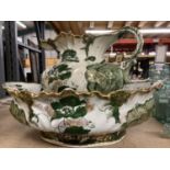 A LARGE VICTORIAN WASHBOWL AND JUG WITH GREEN AND GOLD COLOURED DECORATION - JUG A/F