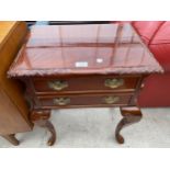 A CHIPPENDALE STYLE TWO DRAWER CHEST ON OPEN BASE WITH CABRIOLE LEGS, 20" WIDE