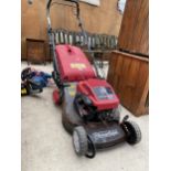 A MOUNTFIELD PETROL LAWN MOWER WITH BRIGGS AND STRATTON ENGINE AND GRASS BOX
