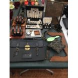 A LARGE QUANTITY OF COLLECTABLE ITEMS TO INCLUDE WALL LAMPS, BOXED FLATWARE, LEATHER BRIEFCASE,