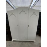 A WHITE PAINTED TWO DOOR WARDROBE