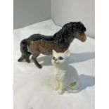 A BESWICK WHITE CAT AND A BESWICK SHETLAND PONY (EARS A/F)
