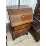 AN EDWARDIAN MAHOGANY CROSSBANDED AND SHELL INLAID BUREAU, 24" WIDE