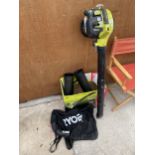 A RYOBI LEAF BLOWER WITH BAG AND ATTATCHMENTS BELIEVED IN WORKING ORDER BUT NO WARRANTY