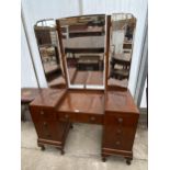 A MID 20TH CENTURY WALNUT KNEEHOLE DRESSING TABLE WITH TRIPLE MIRROR ON CABRIOLE LEGS, 44" WIDE