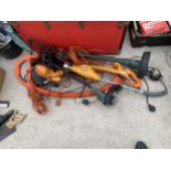 AN ASSORTMENT OF ELECTRIC GARDEN TOOLS TO INCLUDE GRASS TRIMMERS ETC