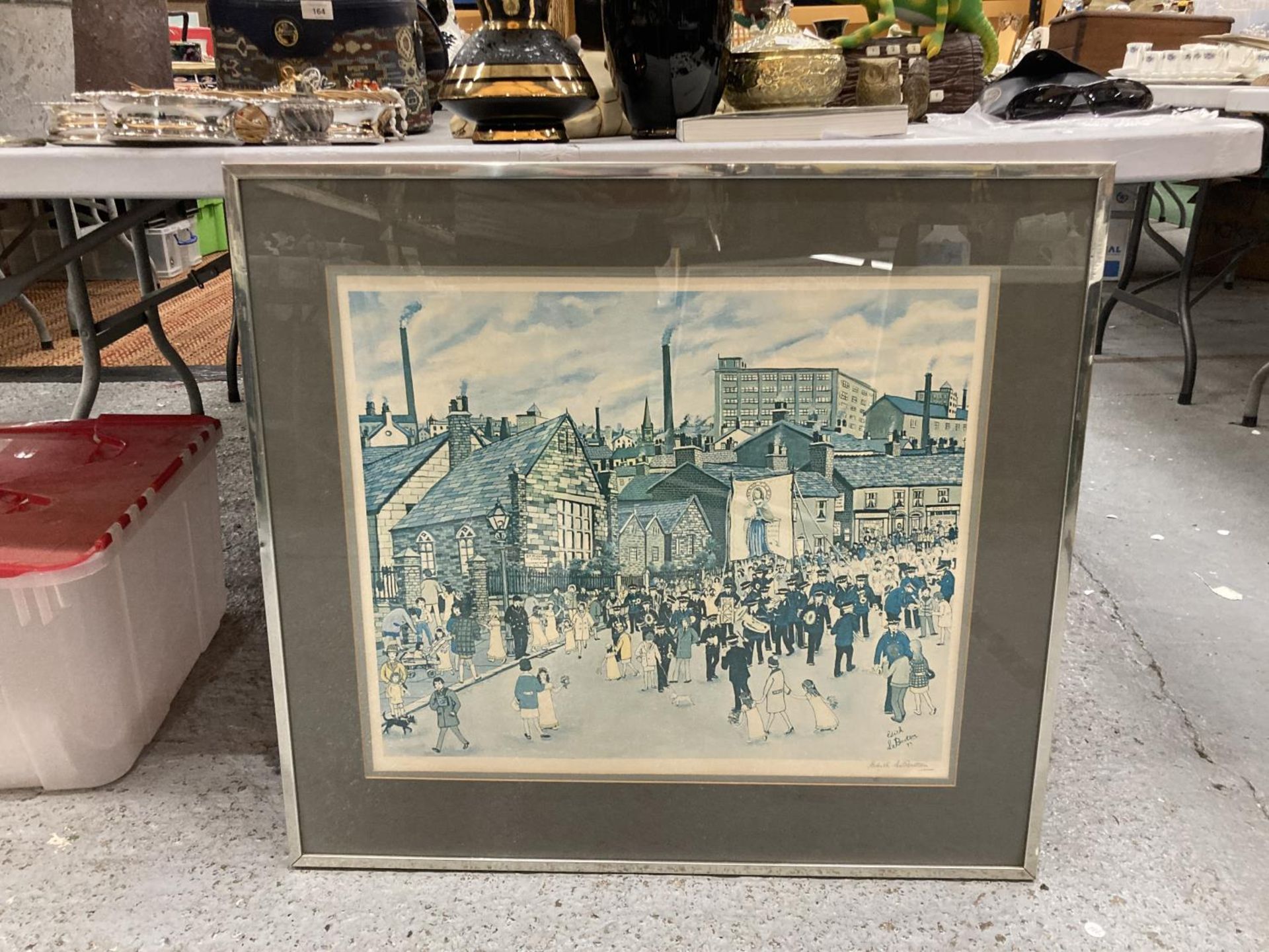 A LARGE EDITH LE BRETON SIGNED PRINT TITLED 'A MILL TOWN PROCESSION' 80CM X 73CM