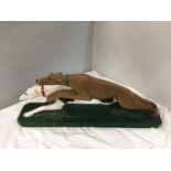 A PAIR OF PAINTED GREYHOUNDS (A/F SMALL CHIPS/REPAIRS)