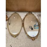 TWO DECORATIVE BRASS FRAMED WALL MIRRORS