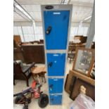 A FOUR SECTION METAL LOCKER UNIT