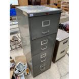 A FOUR DRAWER METAL FILING CABINET