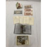 COINS AND BANKNOTES IN A SMALL BOX