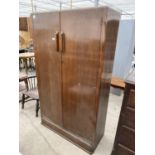 A MID 20TH CENTURY OAK TWO DOOR WARDROBE, 41" WIDE