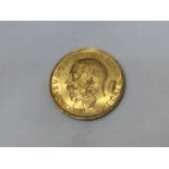 A GOLD SOVEREIGN DATED 1928