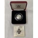 A UK 2006 ?VICTORIA CROSS? , 50P SILVER PROOF COIN. BOXED WITH CERTIFICATE OF AUTHENTICITY