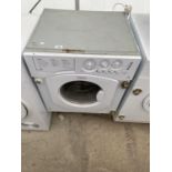 A WHITE HOTPOINT INTERGRATED 7KG WASHING MACHINE