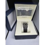A RAYMOND WEIL WATCH WITH CASE AND BOX