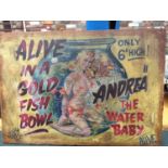 A WOODEN CIRCUS SIGN FEATURING ANDREA THE WATER BABY ALIVE IN A GOLDFISH BOWL