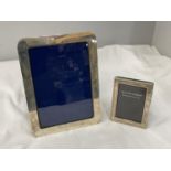 TWO MARKED SILVER PHOTOGRAPH FRAMES ONE 20CM X 15CM AND ONE 10.5CM X 8CM