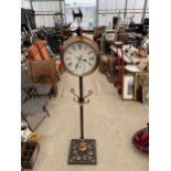 A LARGE DECORATIVE OUTSIDE CLOCK WITH CAST WEATHER VAIN TO THE TOP (H:177CM)