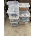 A LARGE QUANTITY OF VARIOUS STORAGE BOXES CONTAINING AN ASSORTMENT OF NEW LIGHT BULBS ETC