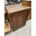 A LATE VICTORIAN OAK WELLINGTON TYPE CHEST OF FIVE DRAWERS, 32" WIDE