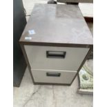 A TWO DRAWER METAL FILING CABINET