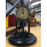 A GERMAN MANTLE CLOCK ON BASE