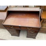 A GEORGIAN MAHOGANY TWIN PEDESTAL DESK ENCLOSING EIGHT DRAWERS, GALLERY TOP WITH FURTHER BRASS