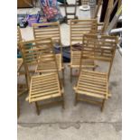 A SET OF FOUR BRAND NEW TEAK FOLDING GARDEN CHAIRS