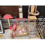 AN ASSORTMENT OF CHILDRENS ITEMS TO INCLUDE A HIGH CHAIR, A SCOOTER AND A WALKER ETC