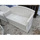 A PLASTIC SUNCAST GARDEN BENCH WITH UNDER SEAT STORAGE